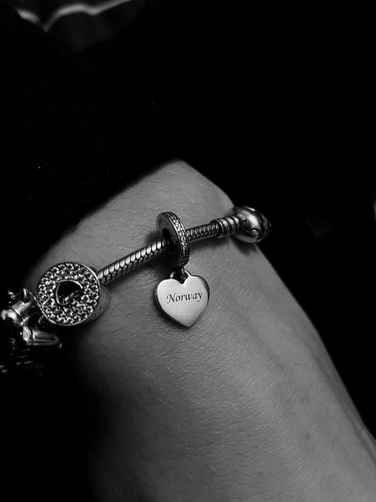 a close up of a person wearing a bracelet