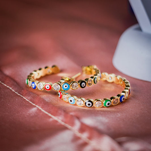 a close up of two rings on a bed