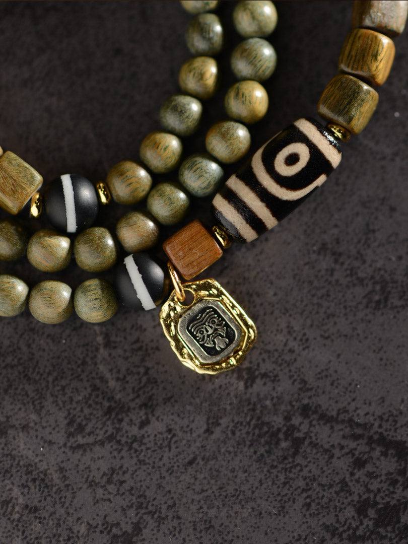 Green Sandalwood Agate Two Eyed Dzi Bead Bracelet