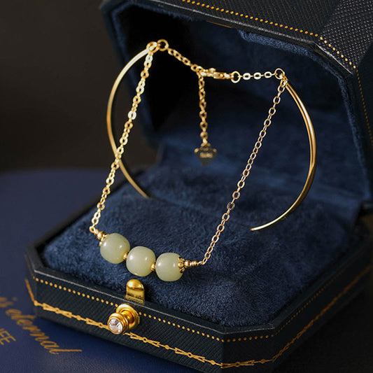 Pulsera de doble capa con cuentas de jade hetiano bañadas en cobre y oro de Buda