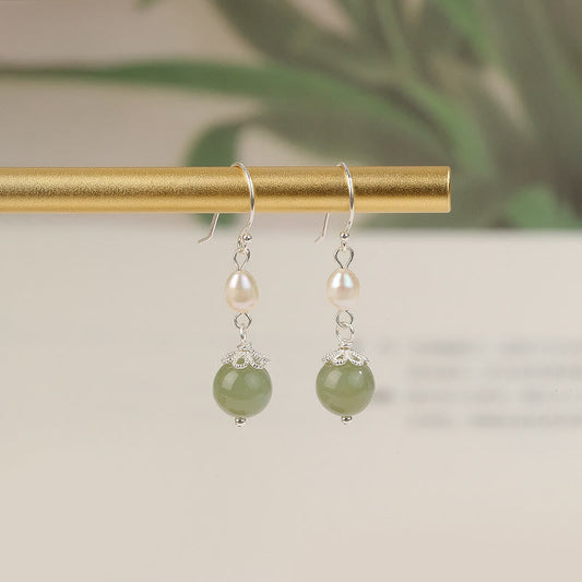 Pendientes de Buda de plata de ley 925 con jade y perla natural.