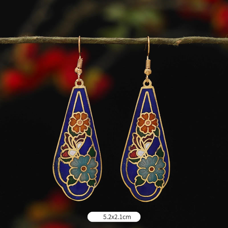 Pendientes colgantes de cobre con diseño de flor de loto y mariposa de Buda y piedras de iluminación