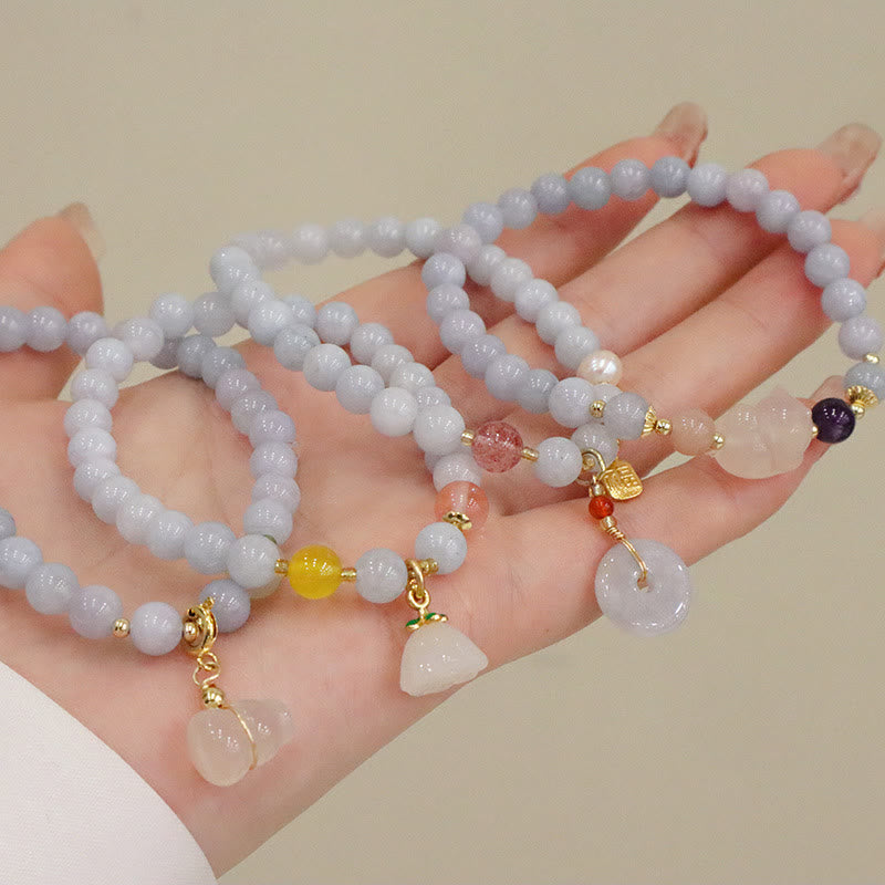 Pulsera con dije de gato, calabaza, conejo y calcedonia natural de aguamarina y piedras de Buda