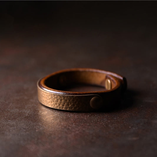 Pulsera de la riqueza con piedras de Buda, hecha a mano, de cuero, cobre y latón.