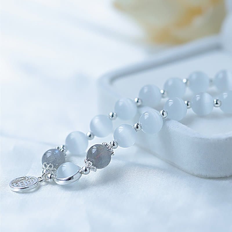Pulsera con abalorios de bola con carácter Fu de piedra lunar y ojo de gato de Buda