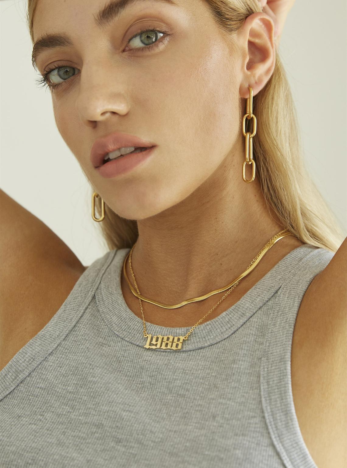 Collar del año de nacimiento de Talia