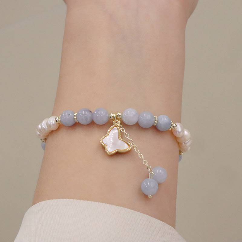 Pulsera con dije de mariposa, hoja de ginkgo y perla de aguamarina natural de Buda