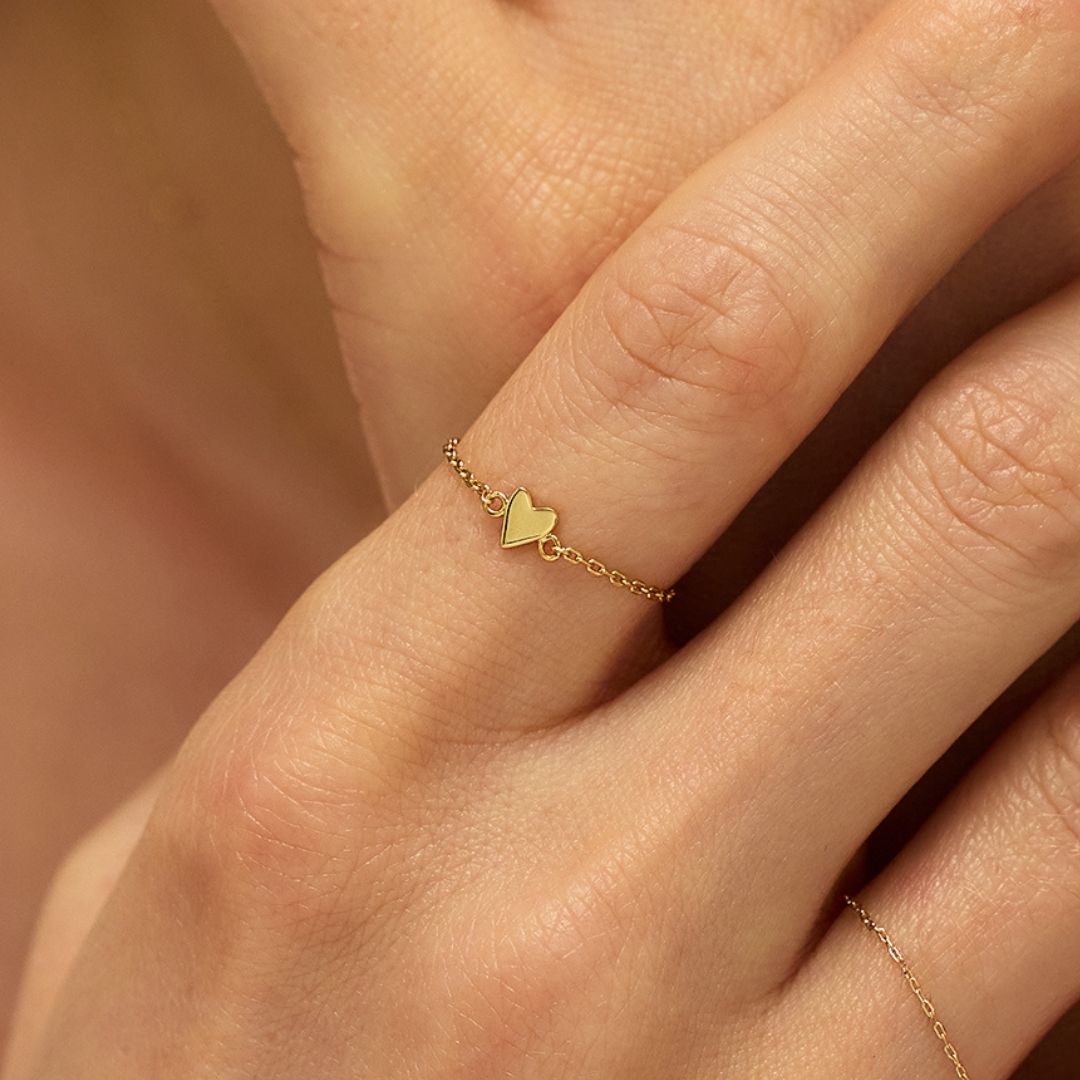 Anillo de cadena con corazón de oro