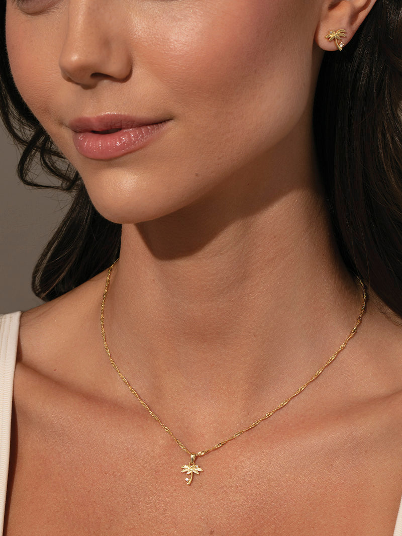 Collar con colgante de palmera