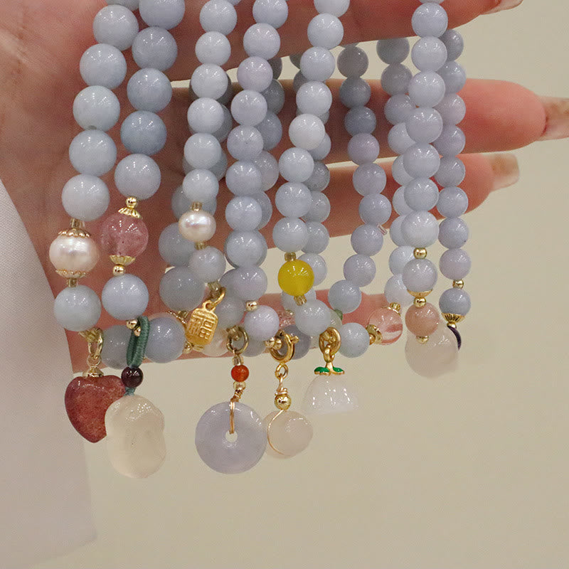 Pulsera con dije de gato, calabaza, conejo y calcedonia natural de aguamarina y piedras de Buda