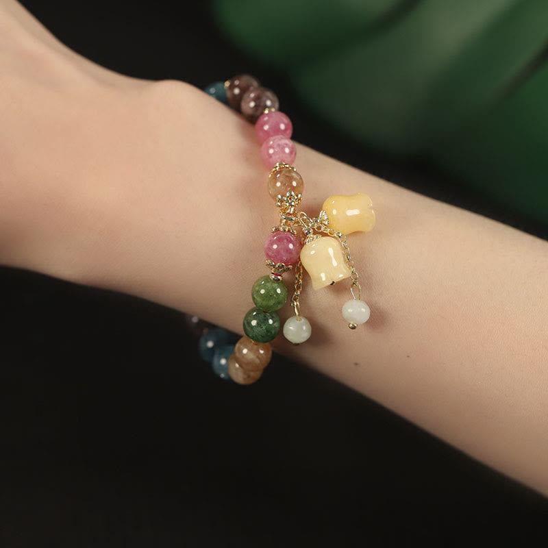 Pulsera de amor con cuentas de flor de turmalina natural y colorida de Buddha Stones