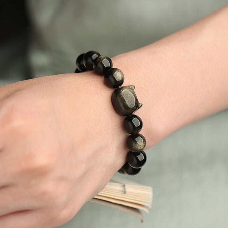 Pulsera de protección con piedras de Buda, obsidiana dorada y obsidiana plateada con brillo, con forma de pata de gato de la suerte.
