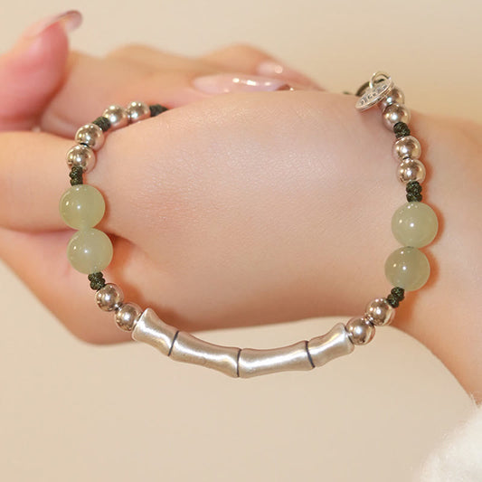 Pulsera de plata de ley 925 con piedras de Buda y jade natural con carácter Fu y bambú.