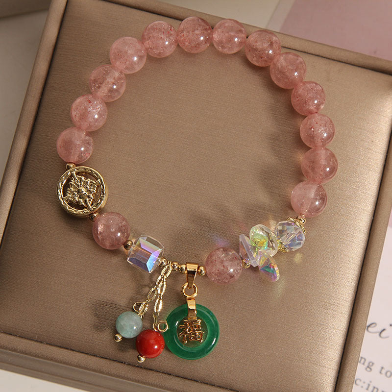 Pulsera curativa con dijes de jade fu y cuarzo fresa de Buda