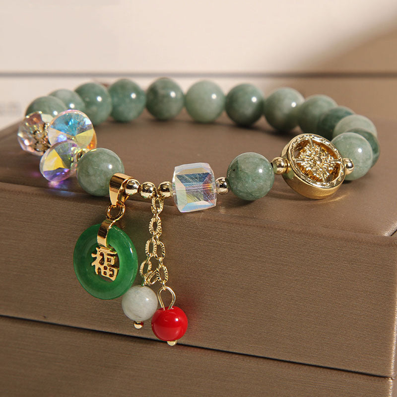 Pulsera curativa con dijes de jade fu y cuarzo fresa de Buda