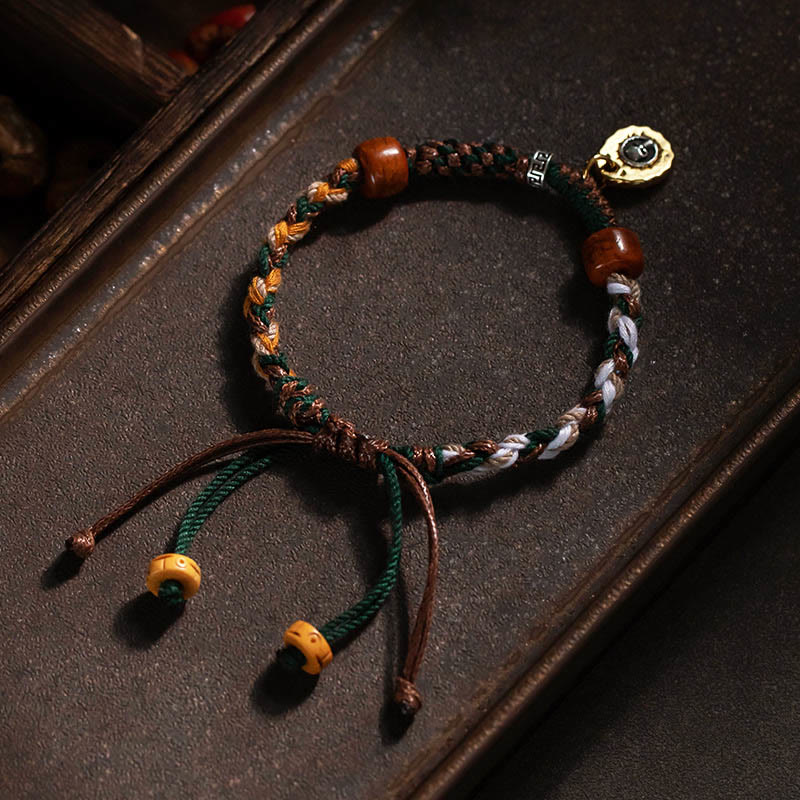 Pulsera de cuerda de la suerte con hueso de camello y hueso de yak tibetano de Buda