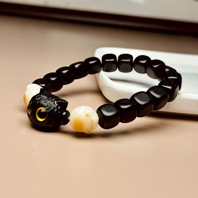 Pulsera de la paz con garras y semillas de bodhi de gato y madera de ébano con piedras de Buda