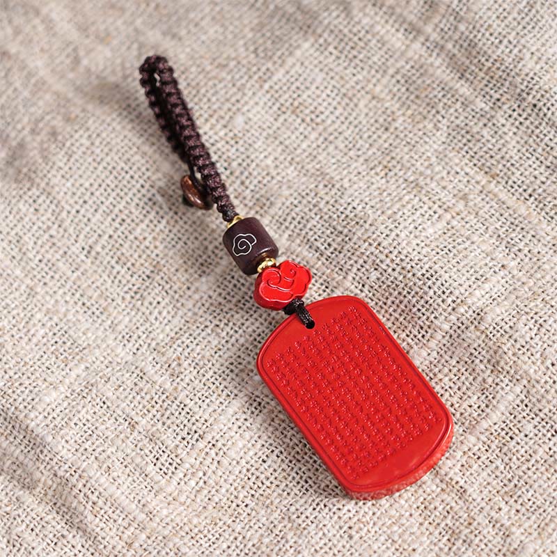 Llavero con la bendición del Sutra del Corazón de cinabrio natural de piedras de Buda