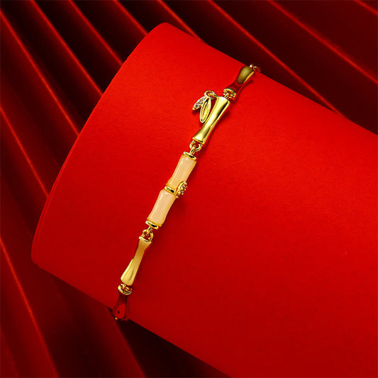 Tobillera de cobre con diseño de bambú dorado y piedras de Buda