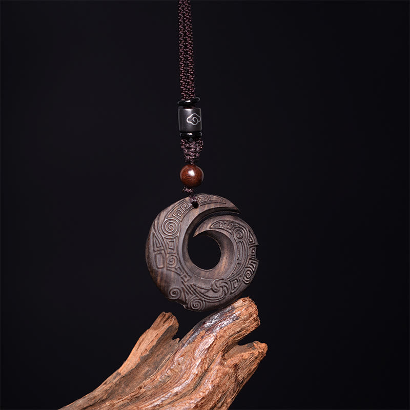 Collar con colgante de paz con diseño de sándalo, ébano y piedras de Buda que mejoran la suerte.