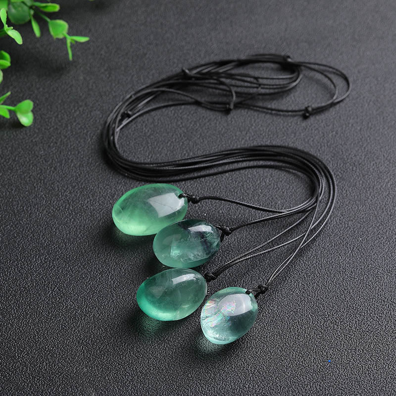 Colgante de fluorita verde con piedras de Buda