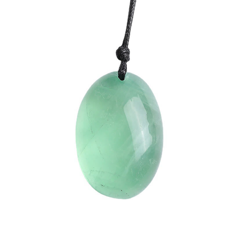 Colgante de fluorita verde con piedras de Buda