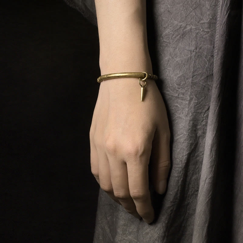 Pulsera sencilla de cobre y latón con piedras de Buda para equilibrar la riqueza