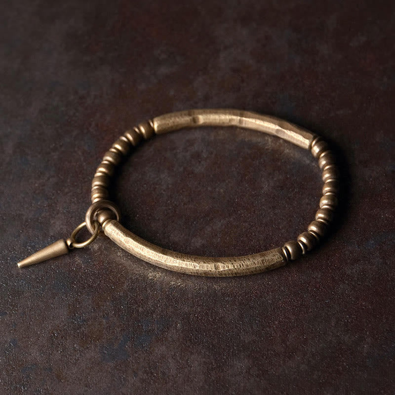 Pulsera sencilla de cobre y latón con piedras de Buda para equilibrar la riqueza