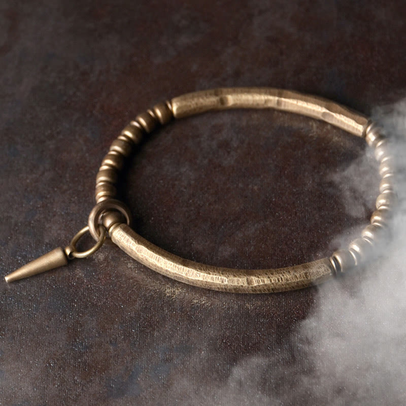 Pulsera sencilla de cobre y latón con piedras de Buda para equilibrar la riqueza
