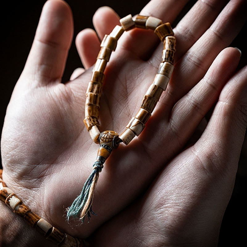 Pulsera de la sabiduría tallada con calavera de hueso de yak y hueso de ciervo tibetano de Buda