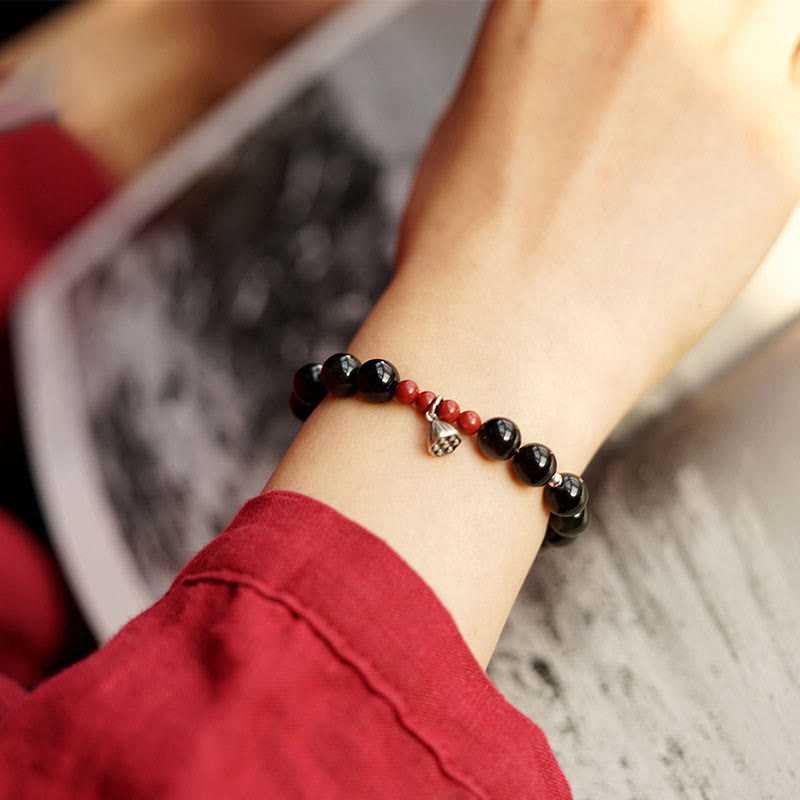 Pulsera de piedra de Buda con obsidiana negra natural, cinabrio y loto, con amuleto de fuerza y cumplimiento.