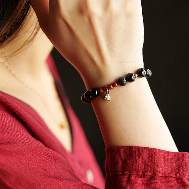 Pulsera de piedra de Buda con obsidiana negra natural, cinabrio y loto, con amuleto de fuerza y cumplimiento.