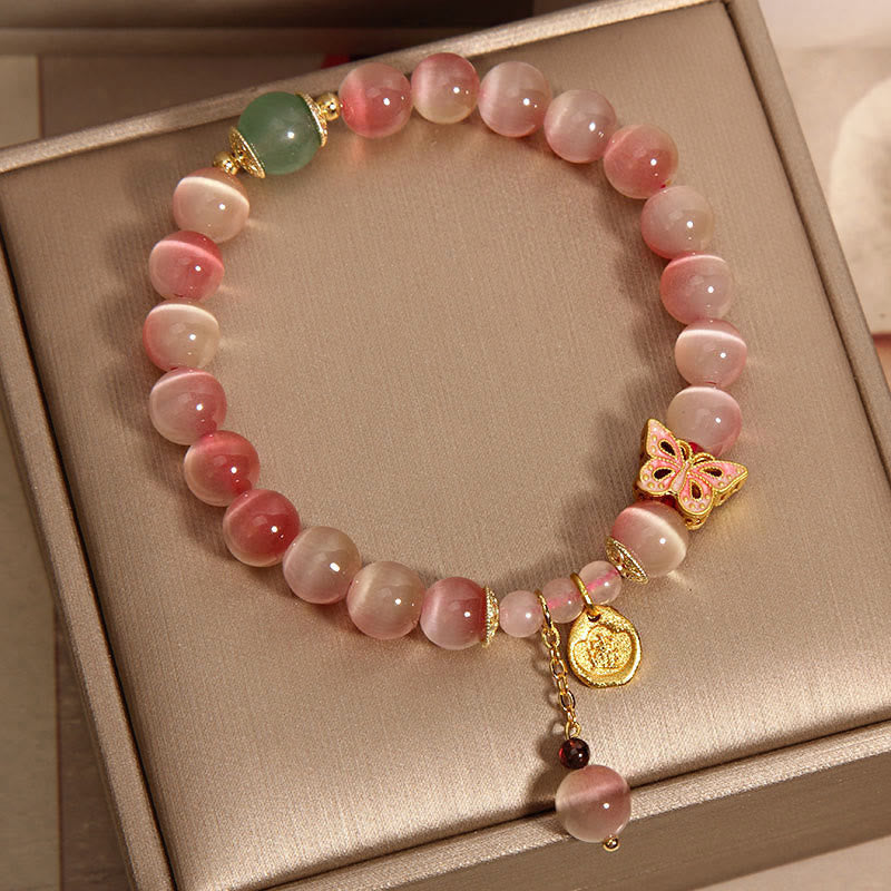 Pulsera de la paz con mariposa y ojo de gato rosa degradado con piedras de Buda