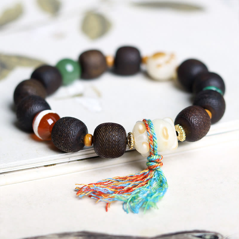 Pulsera de la paz con garra de gato y semillas de bodhi de madera de agar Qinan verde y piedras de Buda