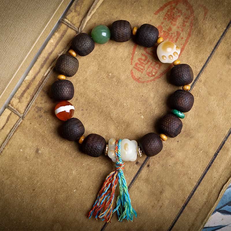 Pulsera de la paz con garra de gato y semillas de bodhi de madera de agar Qinan verde y piedras de Buda