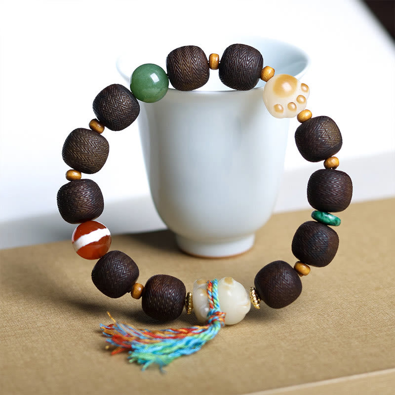 Pulsera de la paz con garra de gato y semillas de bodhi de madera de agar Qinan verde y piedras de Buda