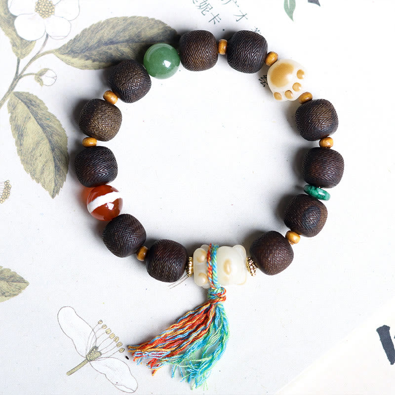Pulsera de la paz con garra de gato y semillas de bodhi de madera de agar Qinan verde y piedras de Buda