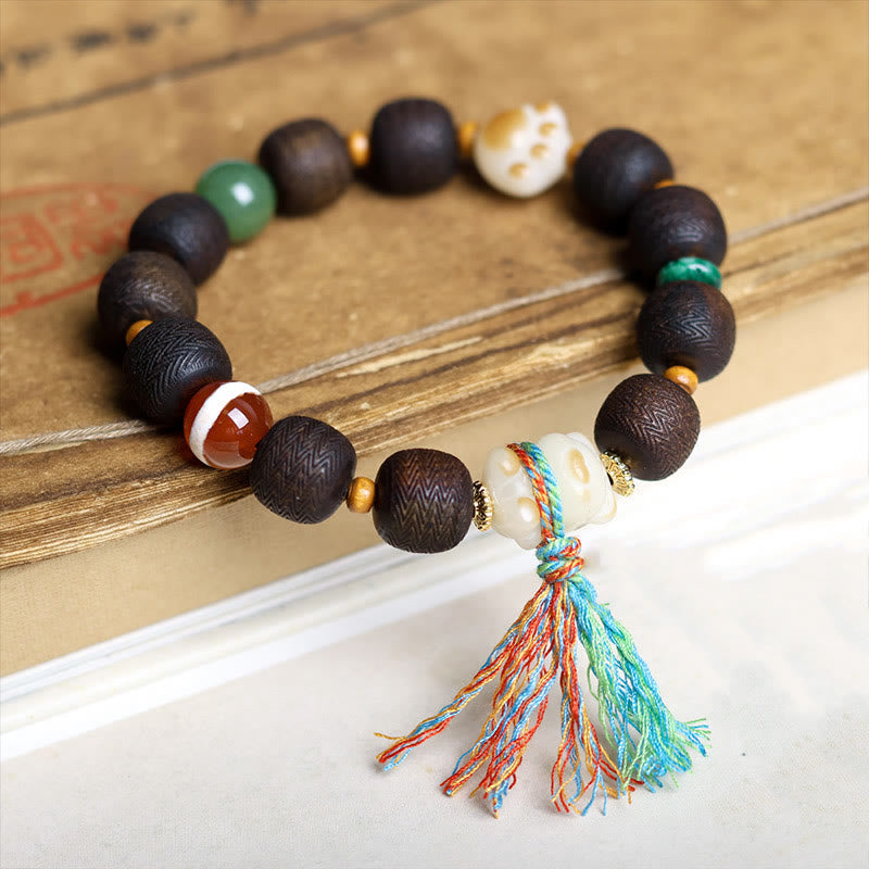 Pulsera de la paz con garra de gato y semillas de bodhi de madera de agar Qinan verde y piedras de Buda