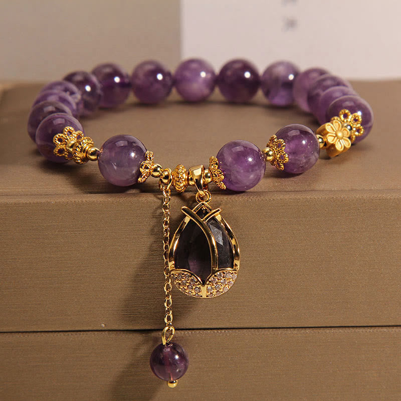 Pulsera de equilibrio con dije de lirio y amatista de Buda