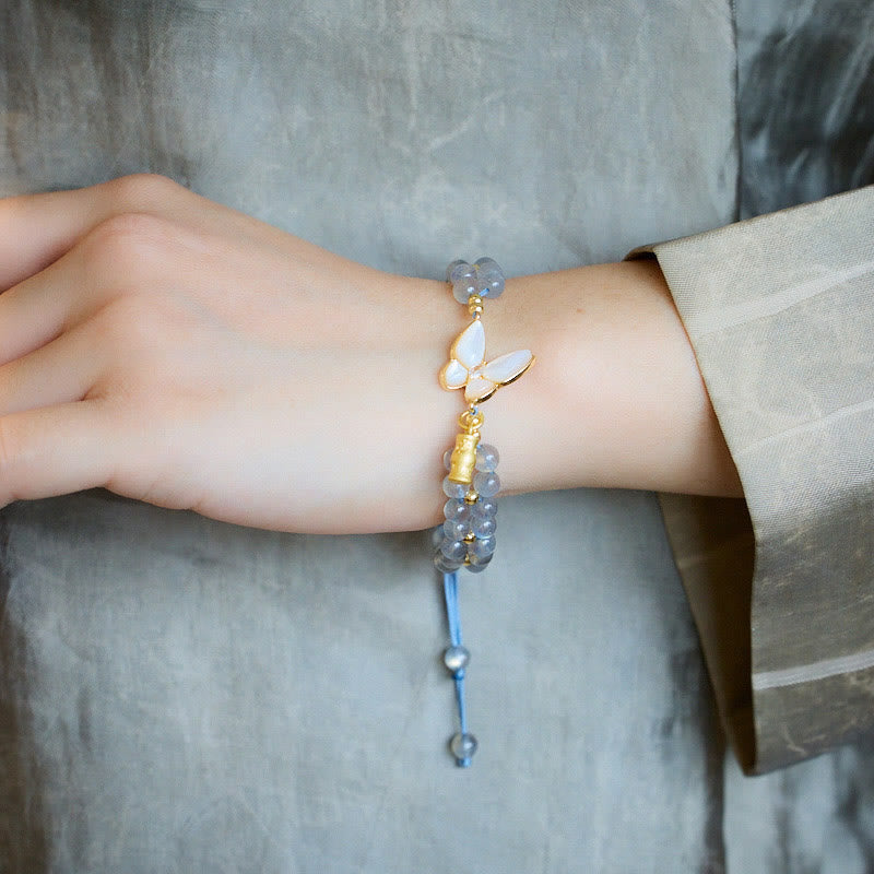 Pulsera de hilo curativo de bambú con mariposas y piedra lunar natural de Buddha Stones