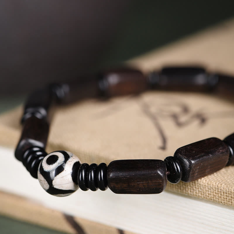 Pulsera de equilibrio con cuentas rectangulares de madera de ébano y piedras de Buda