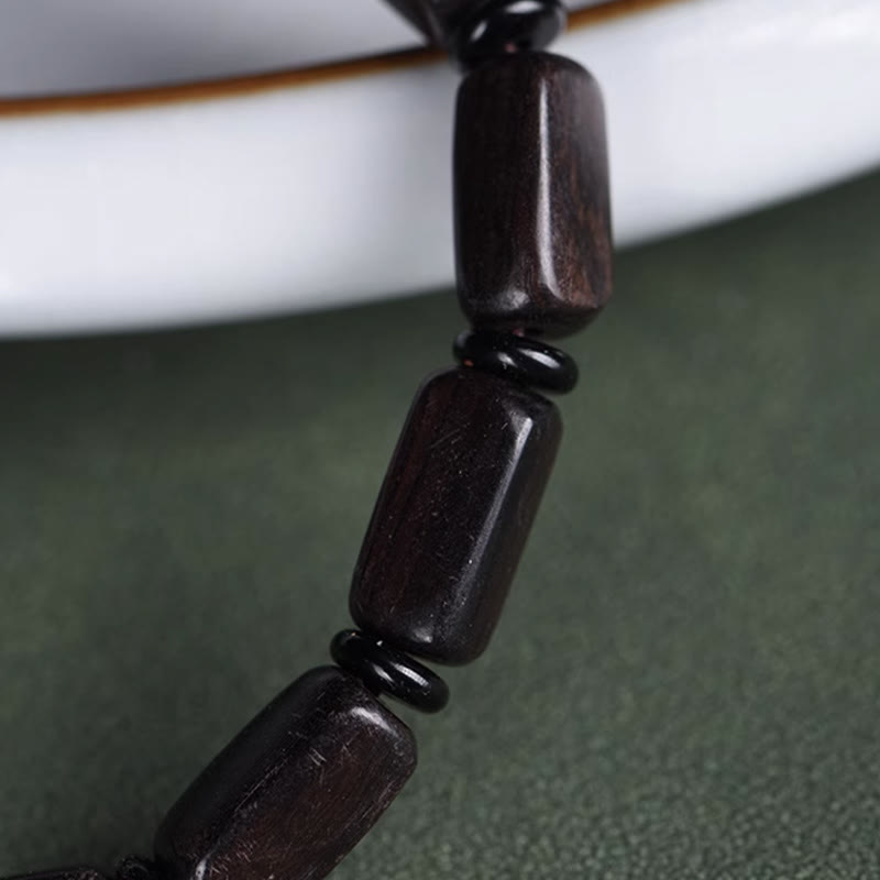 Pulsera de equilibrio con cuentas rectangulares de madera de ébano y piedras de Buda