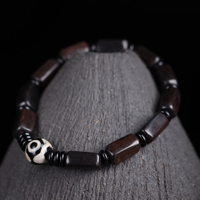 Pulsera de equilibrio con cuentas rectangulares de madera de ébano y piedras de Buda