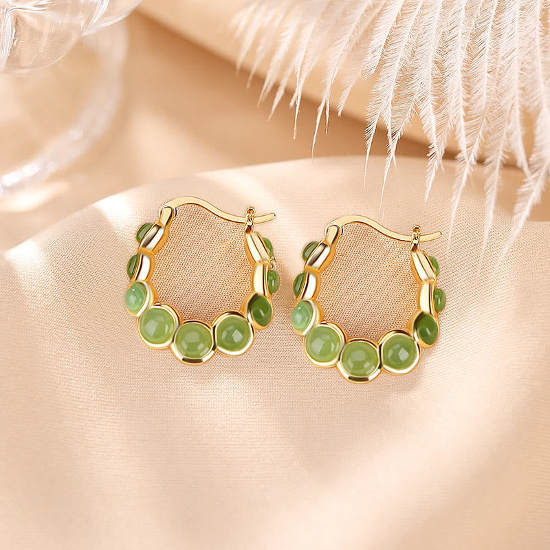 Pendientes de plata de ley 925 con diseño de guisante de jade cian hetiano bañados en oro y piedras de Buda