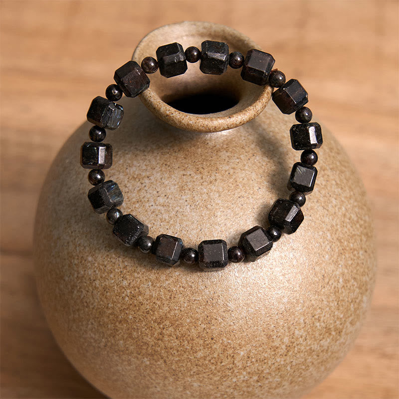 Pulsera de transformación de astrofilita con piedras de Buda