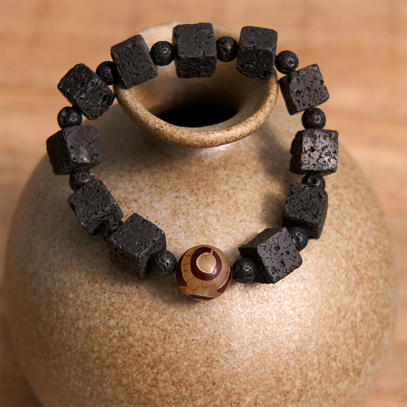 Pulsera curativa con cuentas dzi de roca volcánica y piedras de Buda