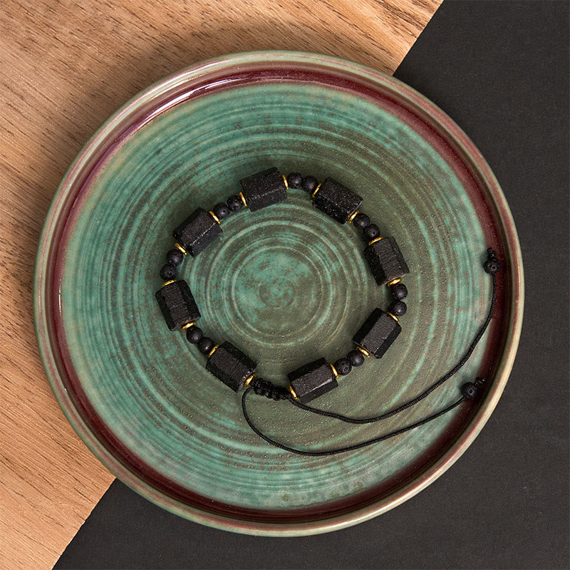 Pulsera de turmalina negra con piedras de Buda