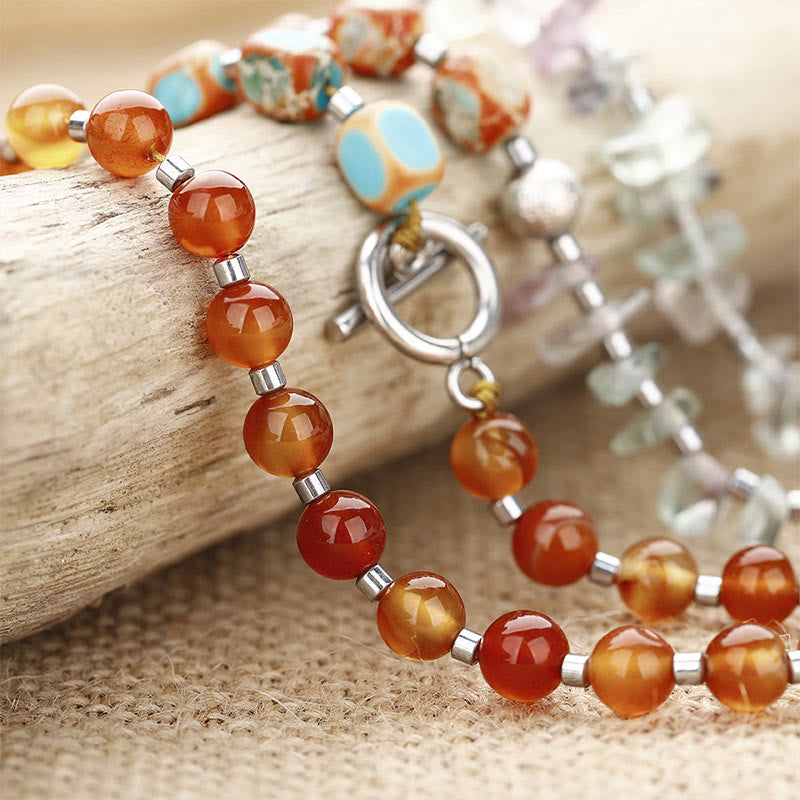 Pulsera triple vuelta con fluorita, ágata roja y piedra emperador.
