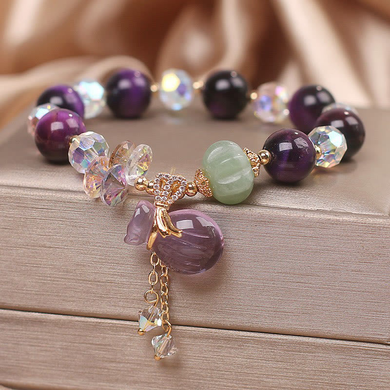 Pulsera de valentía con piedras de Buda, ojo de tigre morado, cristal blanco, amatista y jade