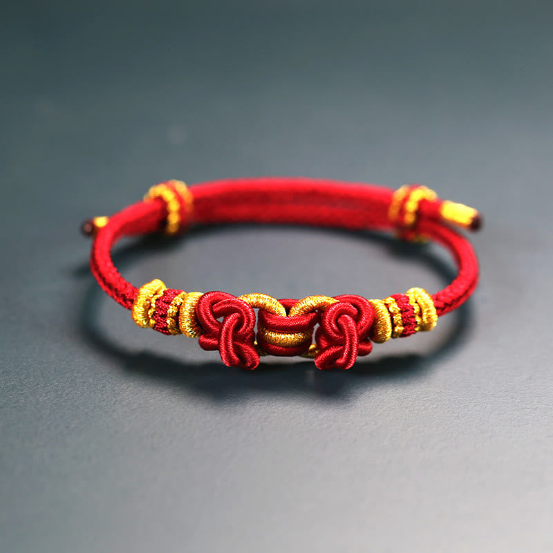 Pulsera de nudo de silla de montar con hilo rojo y piedras de Buda